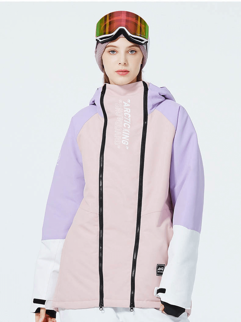 Warm waterproof snowboarding jacket with double zipper in pink and purple, unisex design, ideal for skiing, shown on model with goggles.